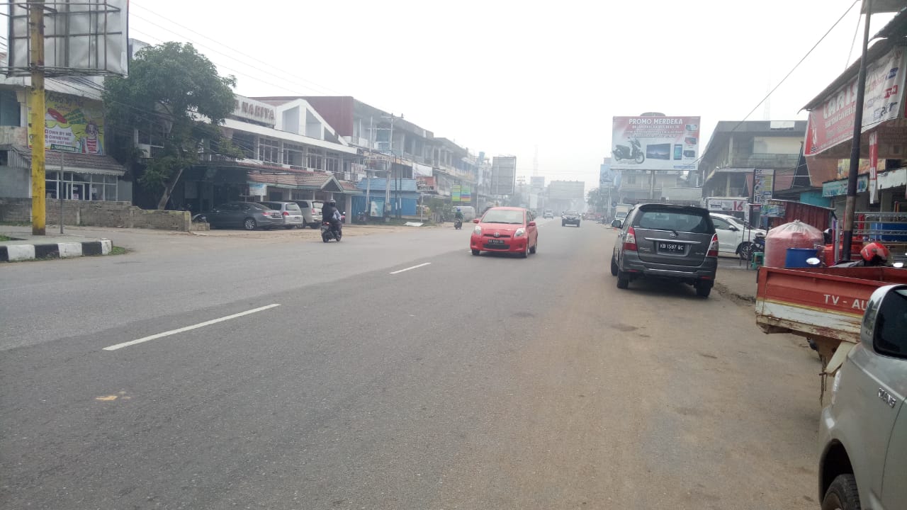 Foto---Kondisi Kota Sanggau yang diselimuti asap pekat per Jumat (20/9) pagi